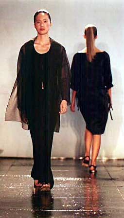 Dawning in grey flocked stripe painter's smock, washable gabardine vesta and bell pant