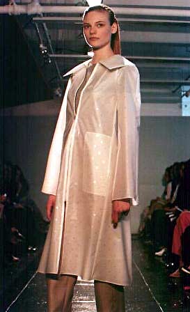 Fabiana in pearl polyurethane polka dot raincoat