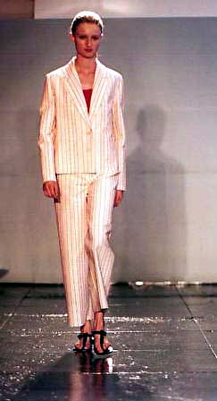 Candice in cotton ticking pantsuit wtih a red silk pique tank